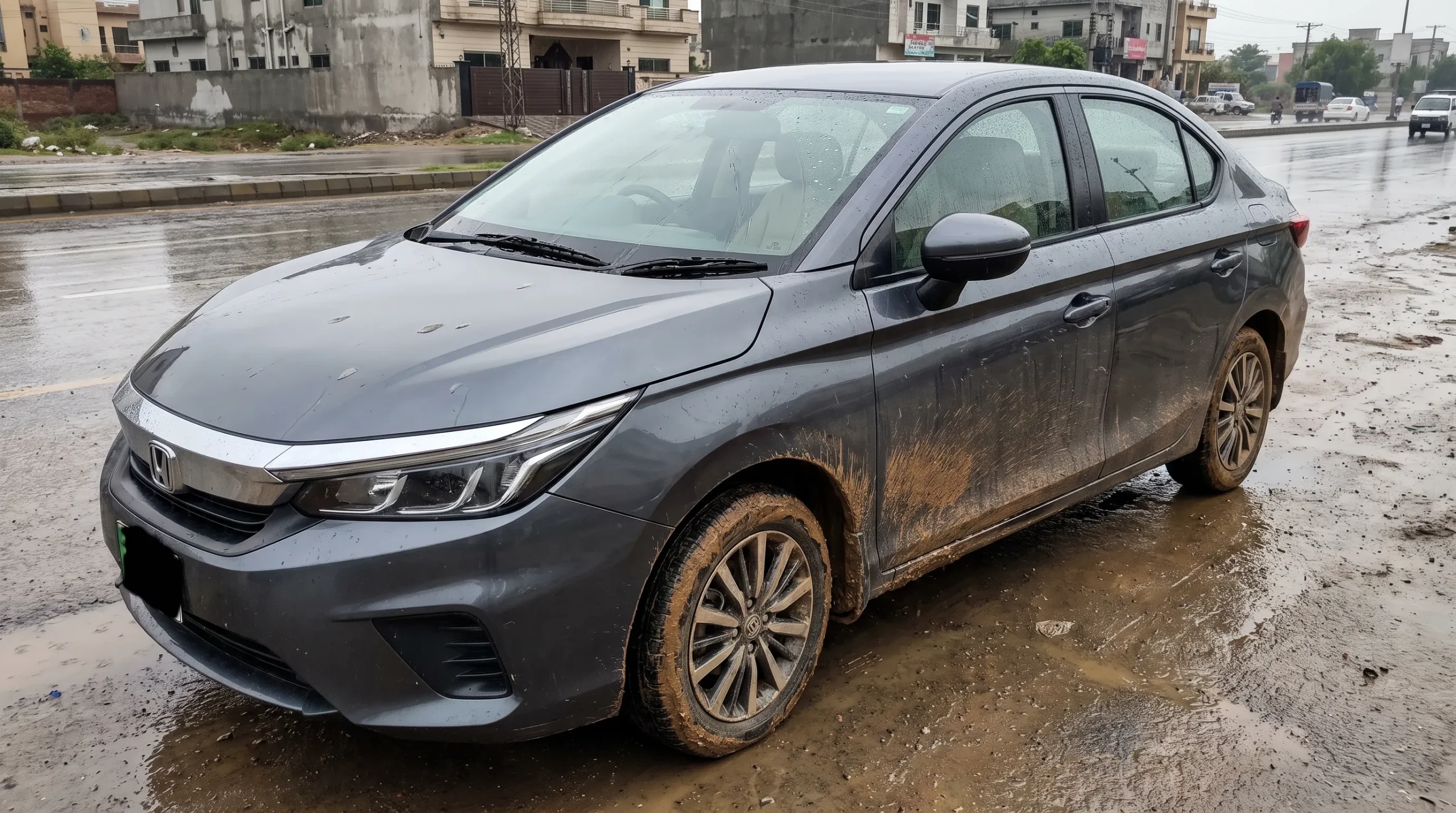 Car covered with mud and rainwater stains after monsoon driving