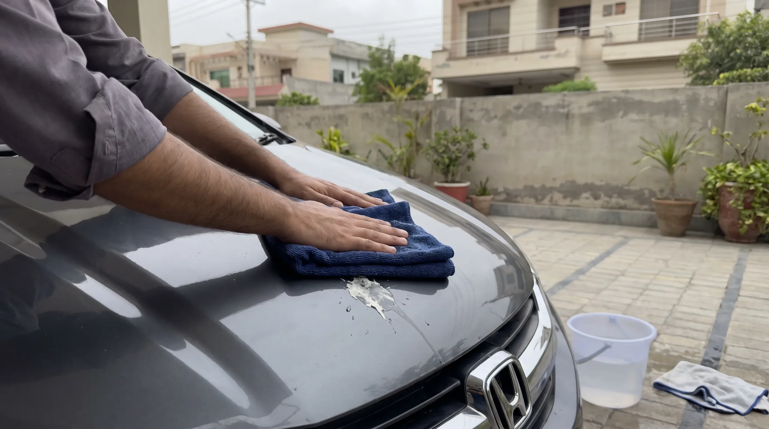 How to Remove Bird Droppings From Car Paint Safely Soaking dried bird droppings with a wet microfiber towel